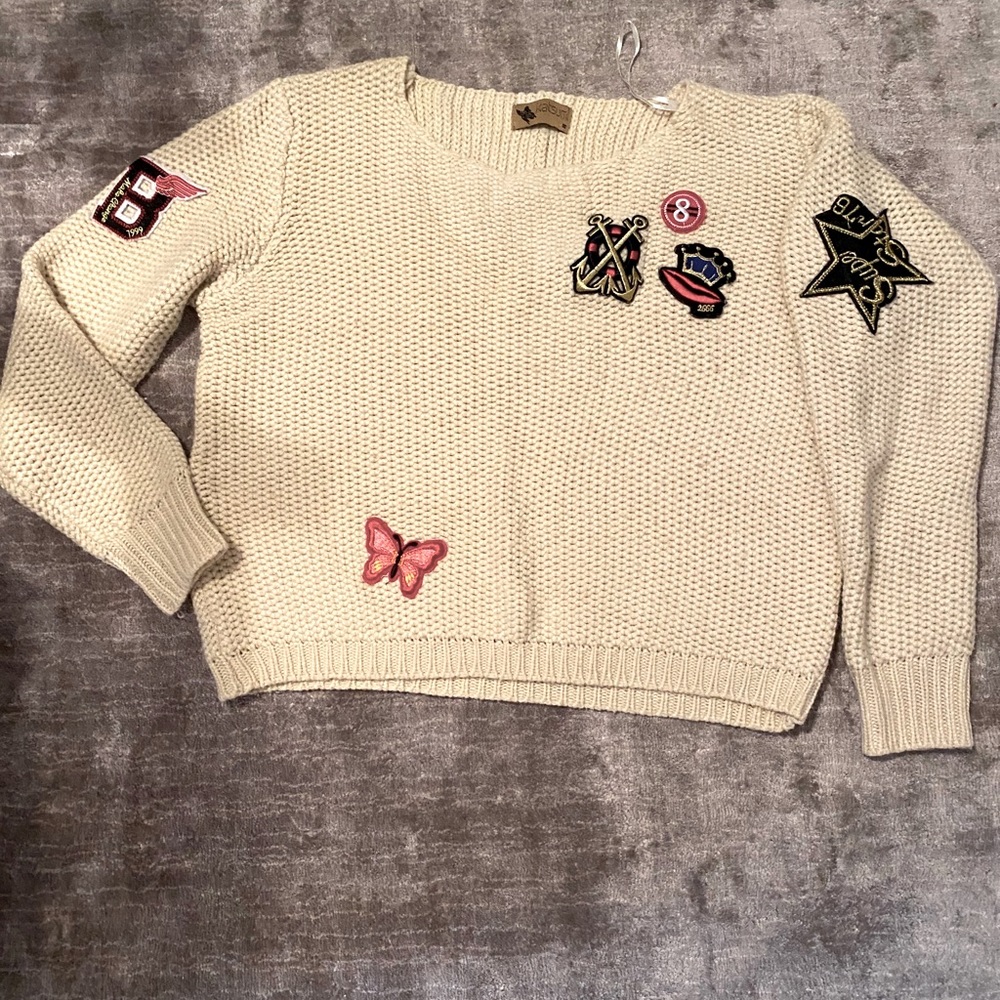 Cream sweater with patches